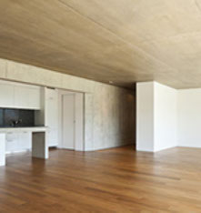 a picture of a wooden floor in a house in a kitchen