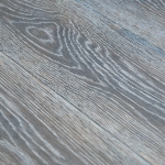 a picture of a grey wooden floor 